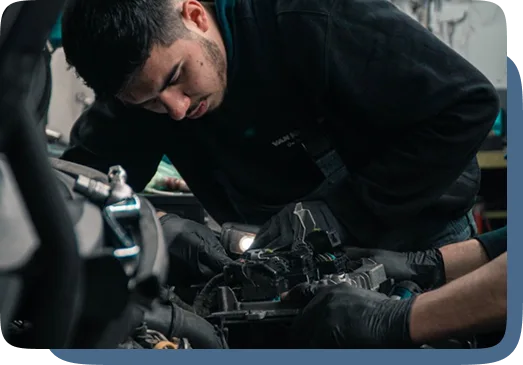 Mechanic working on an engine